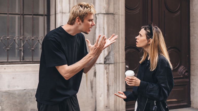 Couple argues on street