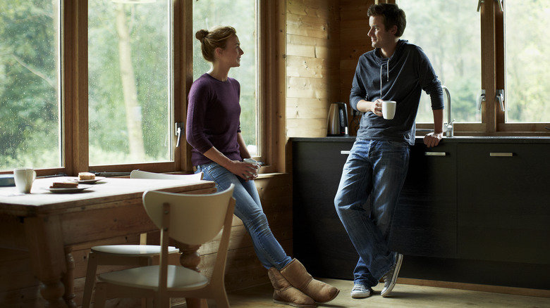 Couple has conversation over coffee