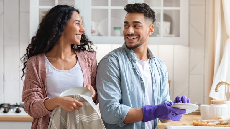 Couple doing chores together 