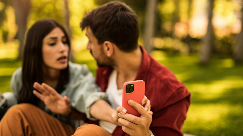 couple arguing over phone