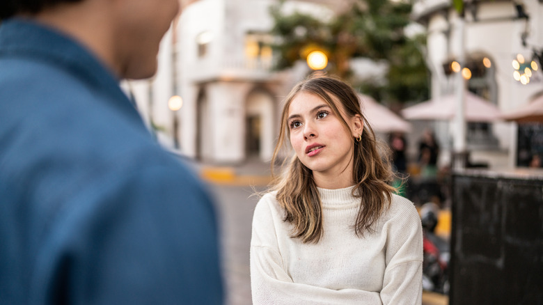 woman talking to man