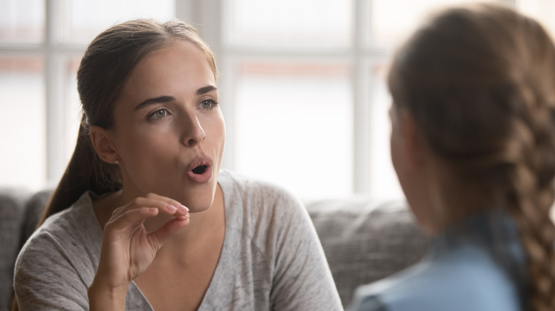 woman talking during therapy session