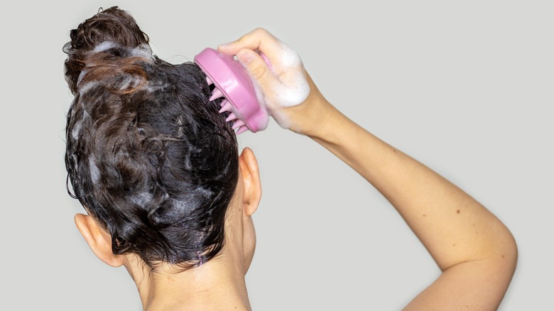  exfoliating with scalp brush
