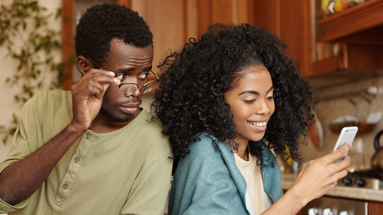 woman looking at phone