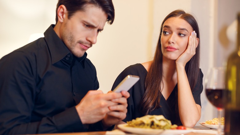 woman with rude man on date