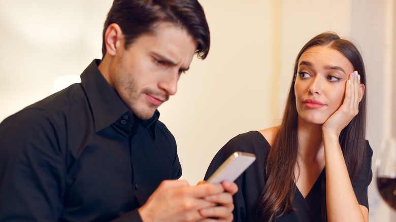 Bored girlfriend watching distracted boyfriend