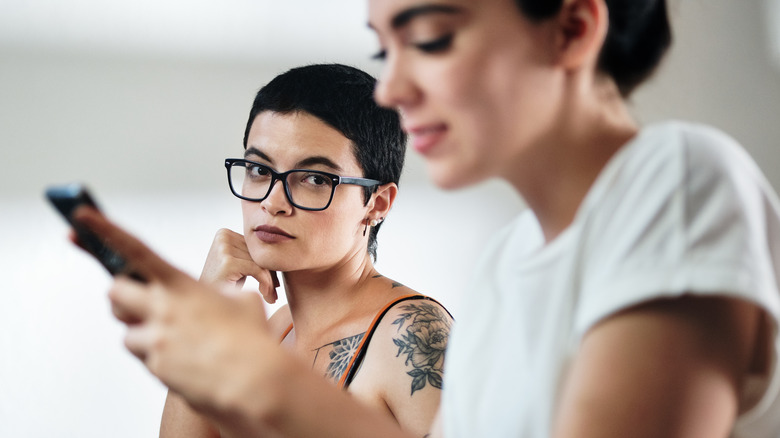 Disappointed woman looking at partner