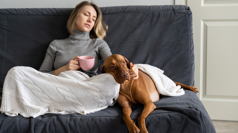 sad woman with dog