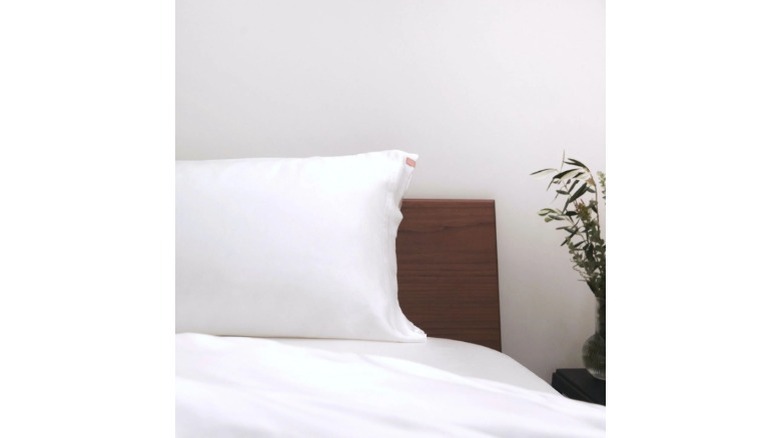 modern bedroom white silk sheets