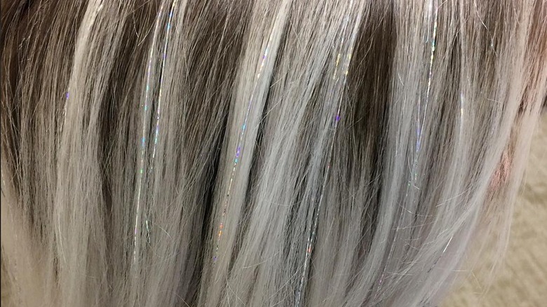 Silver tinsel in platinum highlights 