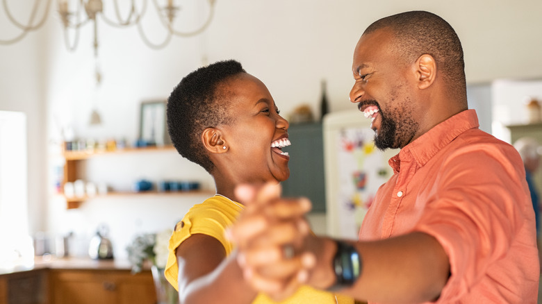 Dancing couple laughing