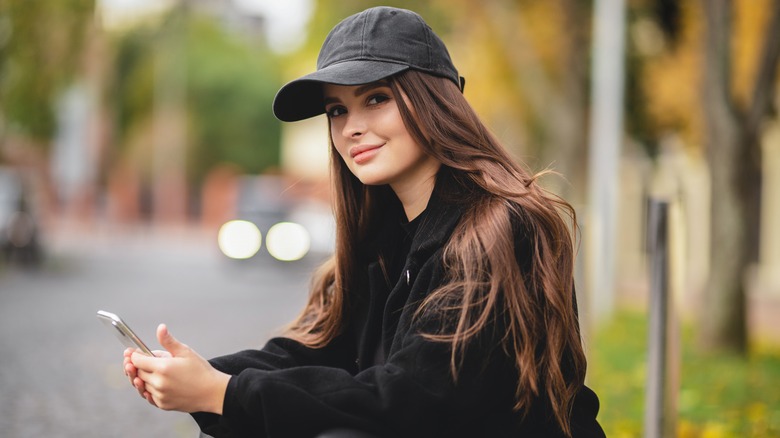 woman wearing baseball cap 