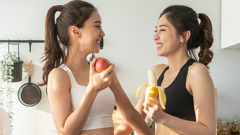 female kitchen eat healthy