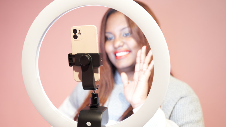 Woman using ring light