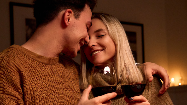 Romantic couple with red wine