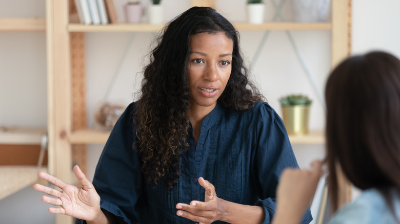 Woman listens to friend