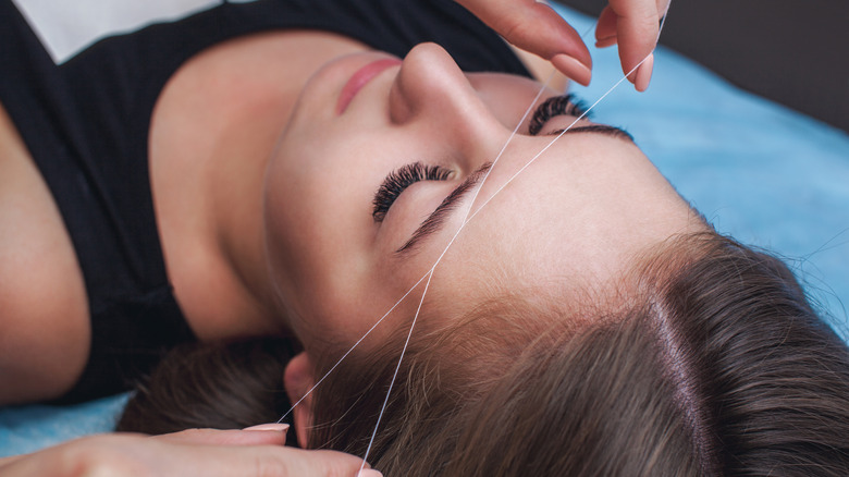 Eyebrow threading