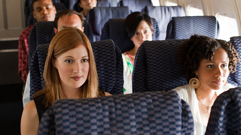 People sitting on an airplane