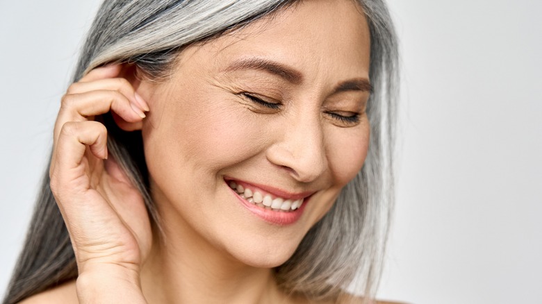 A smiling middle-aged woman