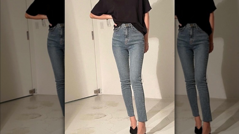 Woman in skinny jeans with heels