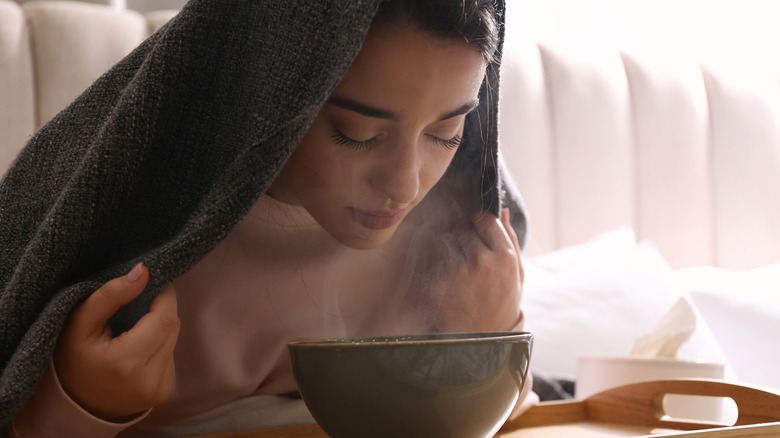 woman steaming face