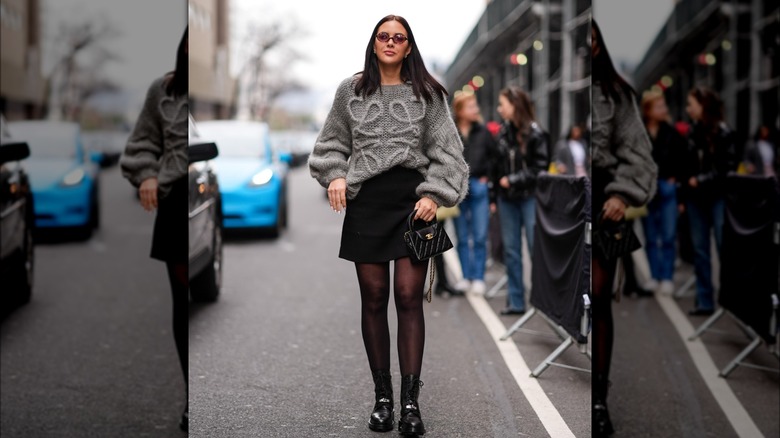 Chunky gray sweater black skirt