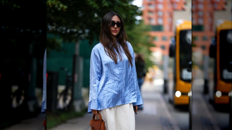 Sky blue button down shirt top knot