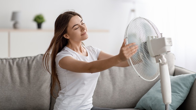 woman with a fan