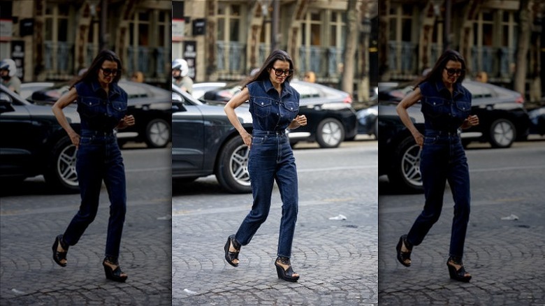 woman wearing denim top and jeans