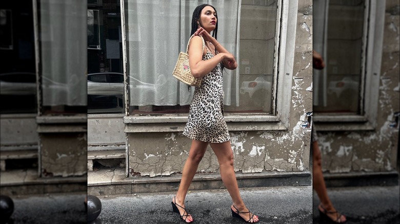 Woman wearing leopard print slip dress with slingbacks