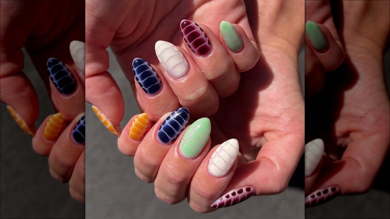 Woman with snake print nails