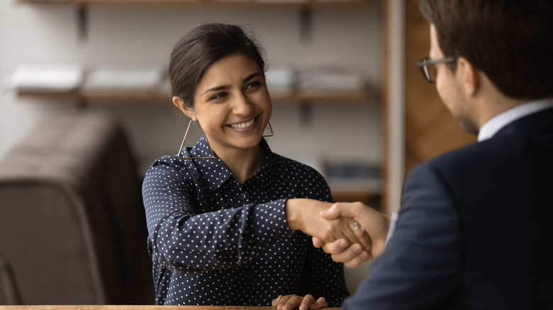 two people shaking hands