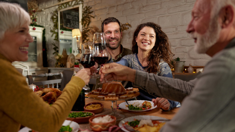 Woman at dinner with in-laws