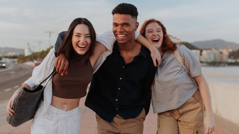 three friends hugging