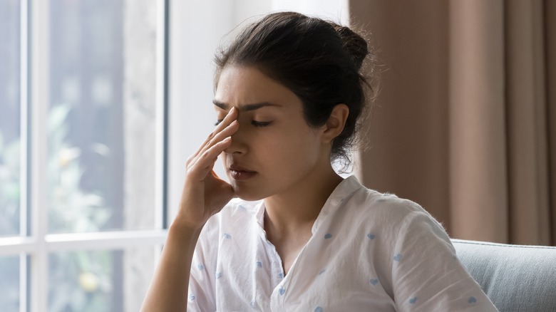 woman looking stressed