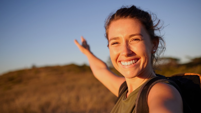 Happy woman in field