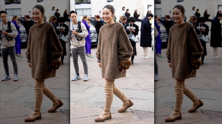 woman wearing fuzzy sock boots