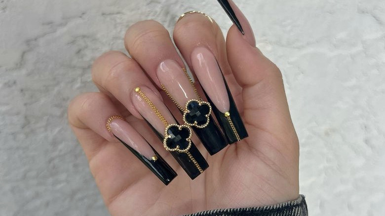 long black and gold French tips 