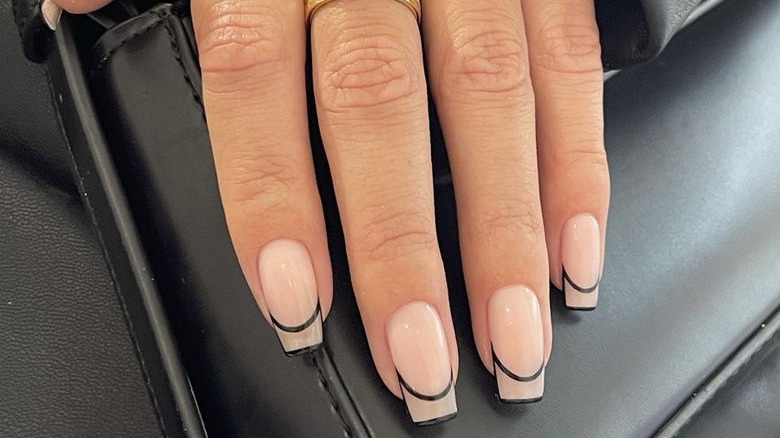 outlined black French tips