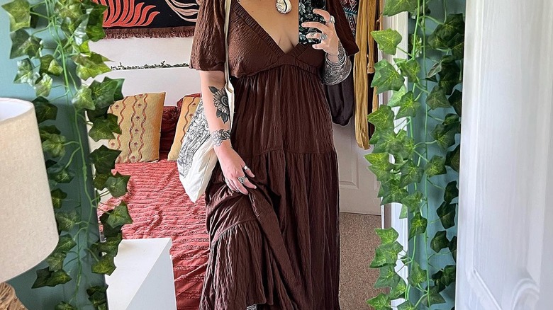 Woman wearing loose-fitting maxi dress