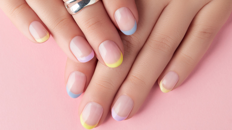 French manicure with pastel multi-colored tips