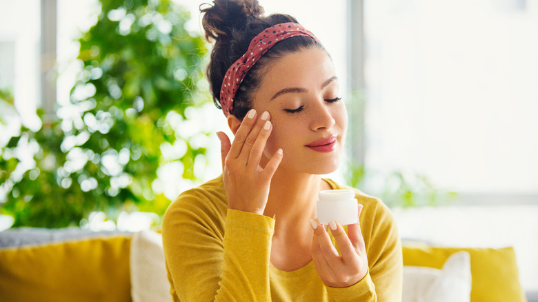 girl applying cream