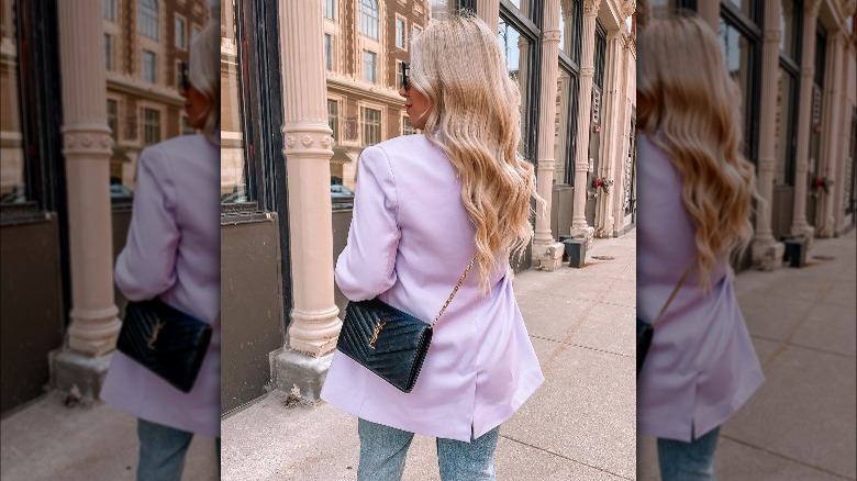 Woman poses in lavender blazer