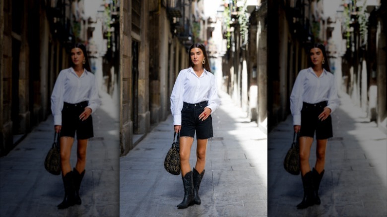 women wearing denim bermuda shorts and whtie top