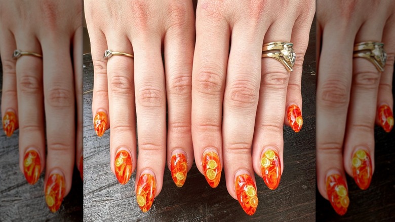 fingernails with oranges