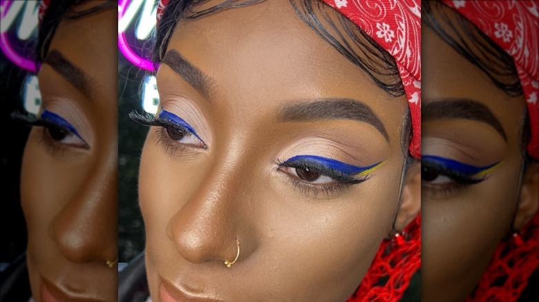 woman with blue stacked liner