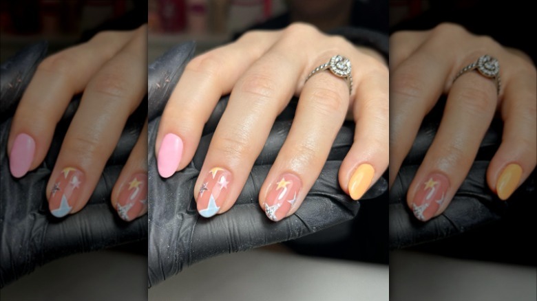 woman with pastel star nails