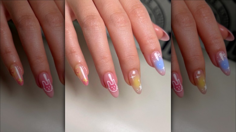 woman with multi colored star nails