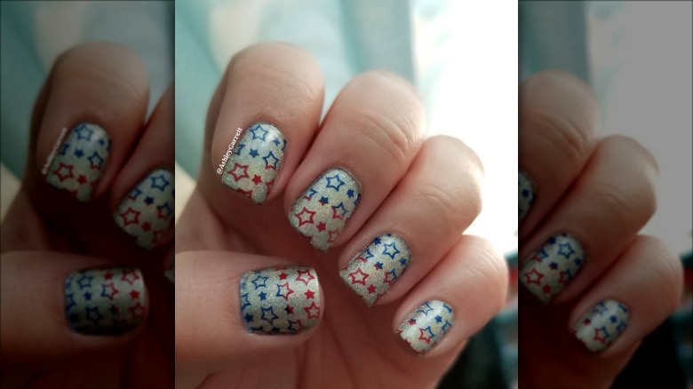 woman with patriotic star nails