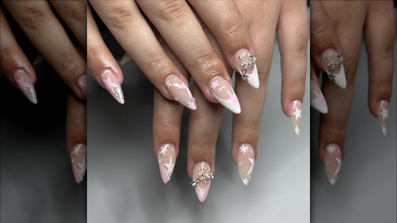 woman with three-dimensional star nails